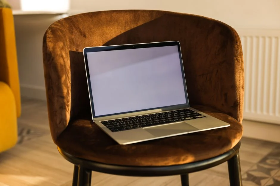 A modern workspace featuring a laptop, a tablet, and smartphones, well suited for tech projects and freelance work.